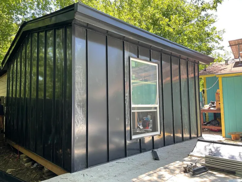 Black standing seam metal wall panels for Metal Roof Installation in Sussex