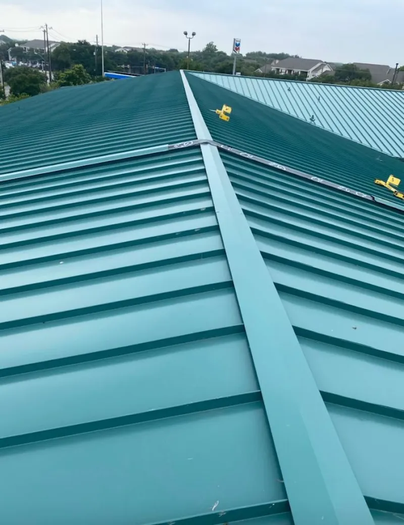 Green commercial metal roof ridge and valley for Metal Roof Repair in Sussex